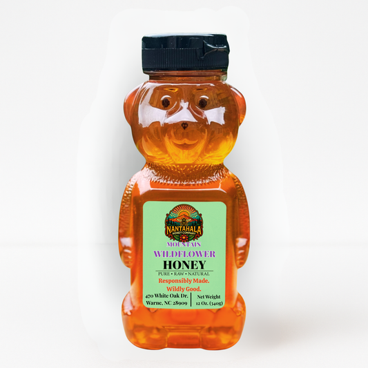 Plastic squeeze bear of raw Mountain Wildflower honey from Nantahala Honey Company in 12 oz plastic bottle.
